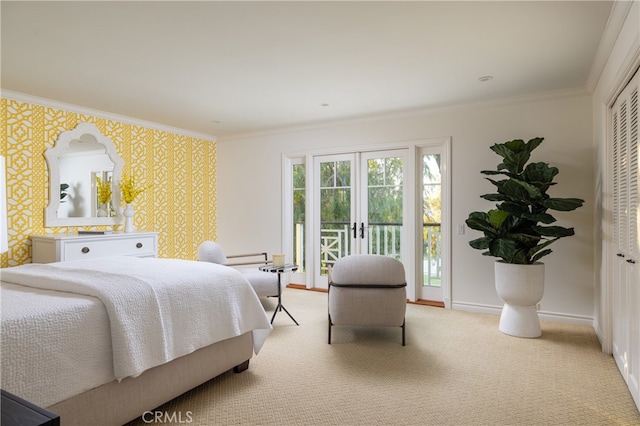 carpeted bedroom with crown molding, access to outside, and french doors