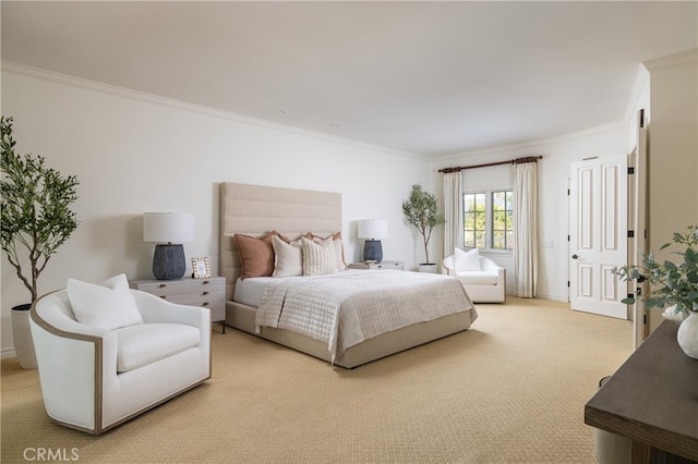 carpeted bedroom with crown molding