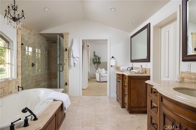 bathroom with vanity, vaulted ceiling, separate shower and tub, and tile patterned flooring