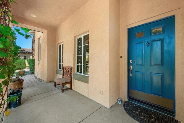 property entrance with a porch