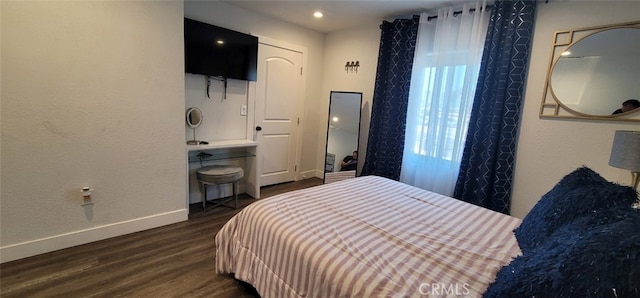 bedroom featuring dark hardwood / wood-style floors