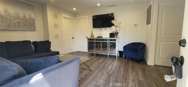 living room featuring dark hardwood / wood-style floors