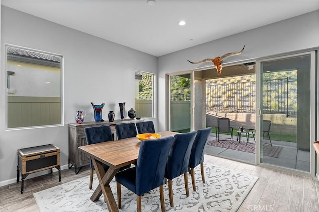 dining area featuring hardwood / wood-style flooring