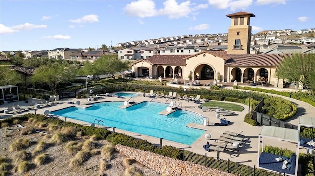 view of swimming pool with a patio area