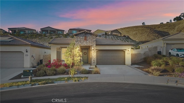 view of front of home featuring a garage