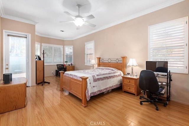 bedroom featuring multiple windows, ceiling fan, and light hardwood / wood-style floors