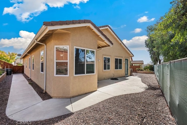 view of home's exterior featuring a patio