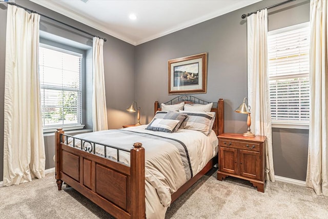 bedroom featuring light colored carpet and crown molding