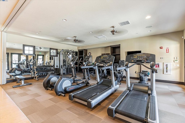 exercise room featuring ceiling fan