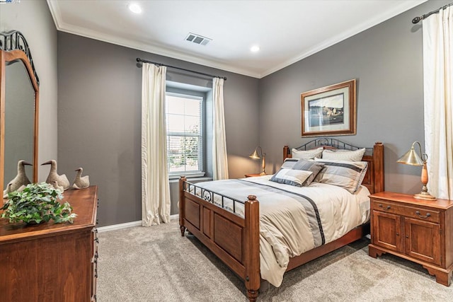 carpeted bedroom with ornamental molding