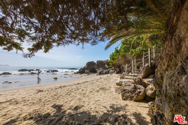 exterior space with a view of the beach