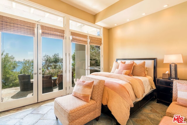 bedroom featuring french doors and access to exterior