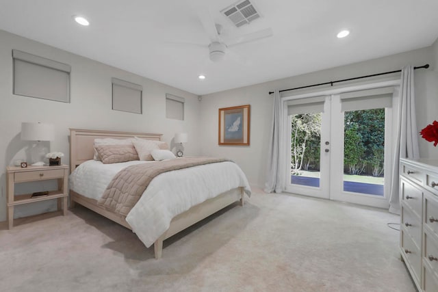 carpeted bedroom with french doors, ceiling fan, and access to exterior