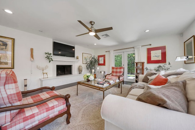 living room featuring ceiling fan