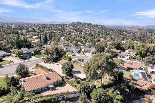 bird's eye view with a mountain view