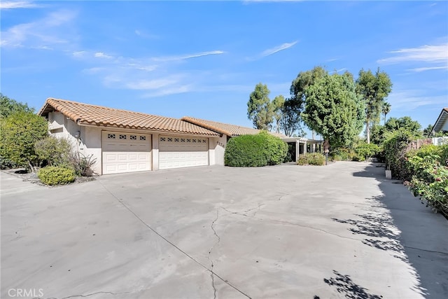 view of home's exterior featuring a garage