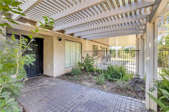 view of patio / terrace featuring a pergola