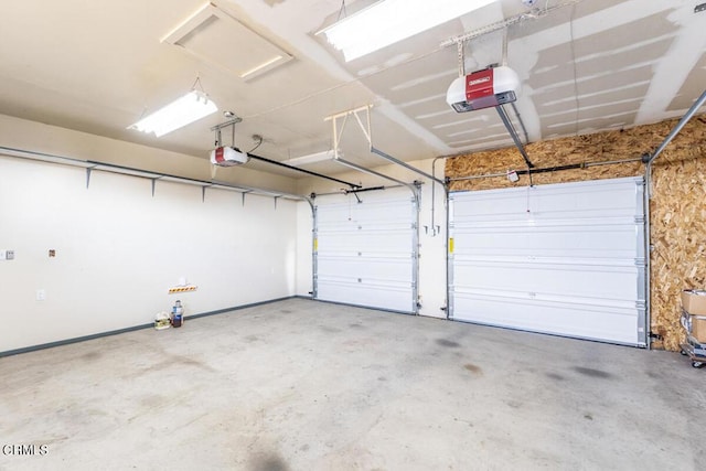 garage featuring a garage door opener