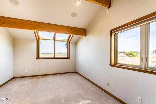 bonus room featuring vaulted ceiling with beams and light colored carpet