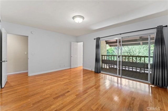 empty room with light wood-type flooring