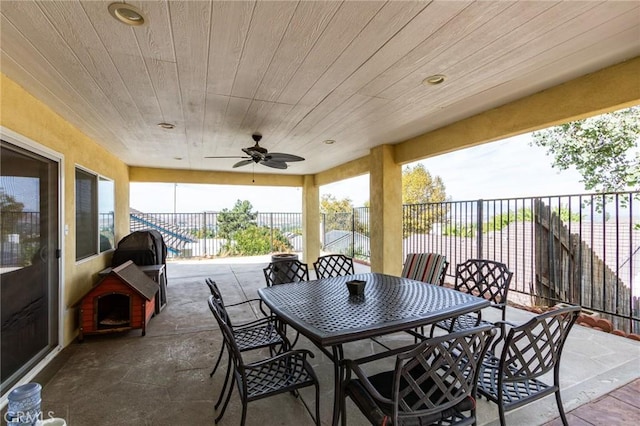 view of patio featuring ceiling fan