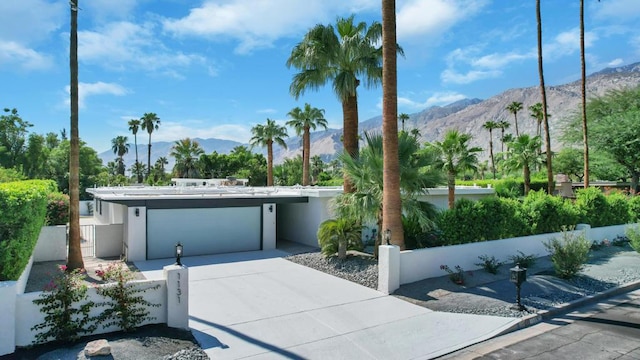 view of front of property with a mountain view