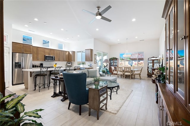 living room with ceiling fan