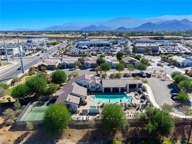 birds eye view of property featuring a mountain view