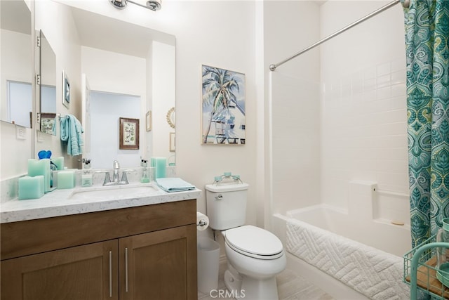 full bathroom with tile patterned floors, vanity, shower / bath combination with curtain, and toilet