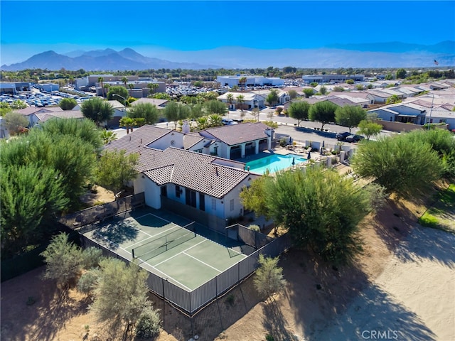 drone / aerial view featuring a mountain view