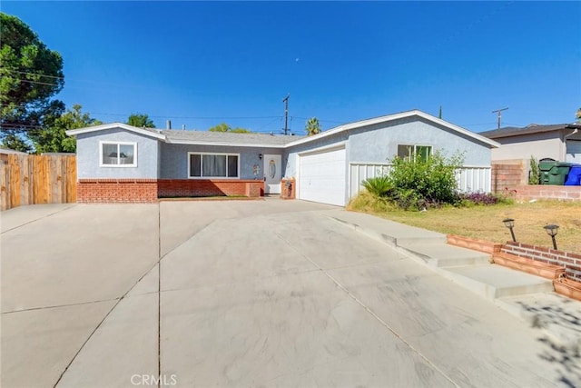 single story home with a garage