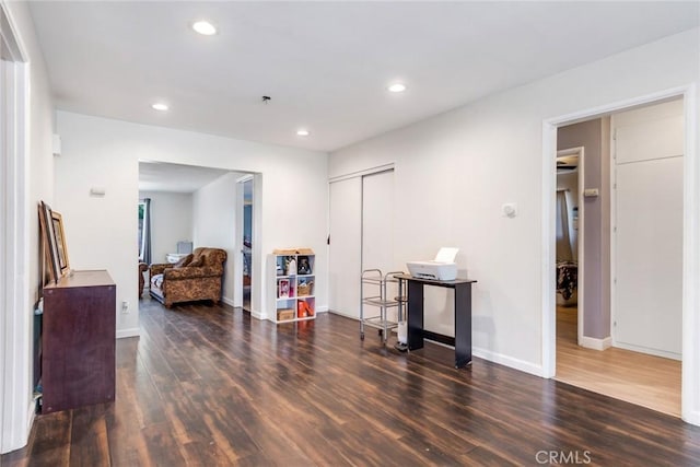 sitting room featuring dark hardwood / wood-style floors