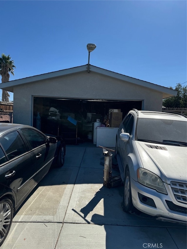 view of property exterior featuring a garage