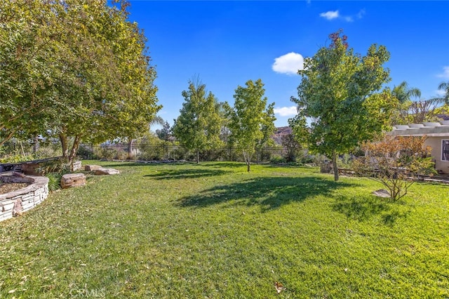 view of yard featuring fence