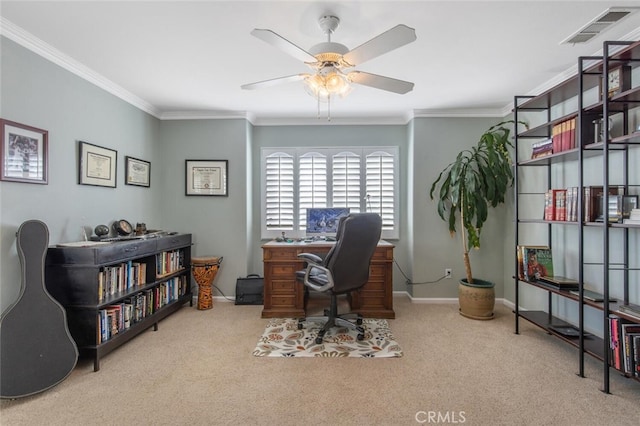 office space with light carpet, visible vents, and ornamental molding