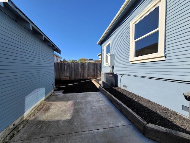 view of home's exterior featuring a patio area and central AC unit