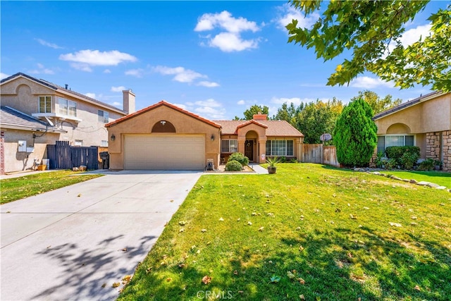 view of front of house featuring a front yard and a garage