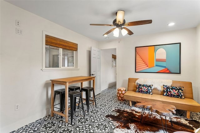 living room featuring ceiling fan