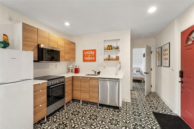 kitchen featuring sink and stainless steel appliances