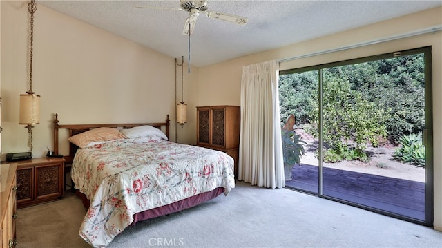 bedroom with carpet floors, a textured ceiling, access to outside, and ceiling fan