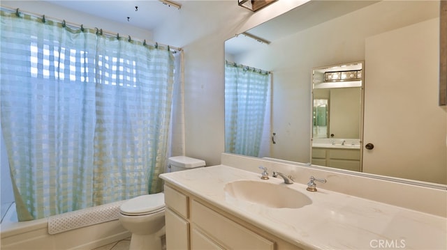 full bathroom with vanity, toilet, shower / bath combination with curtain, and tile patterned flooring