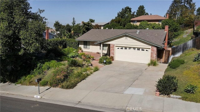 ranch-style home with a garage