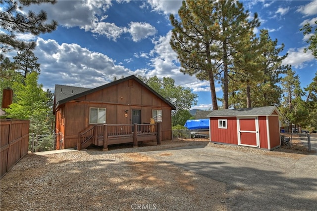 exterior space featuring a storage unit