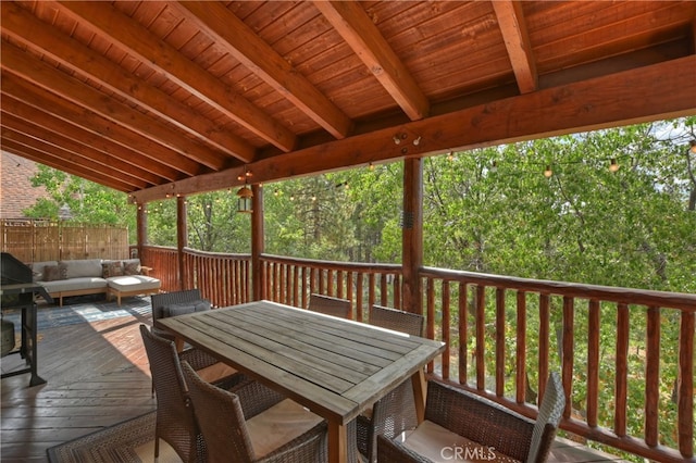 wooden deck with an outdoor hangout area