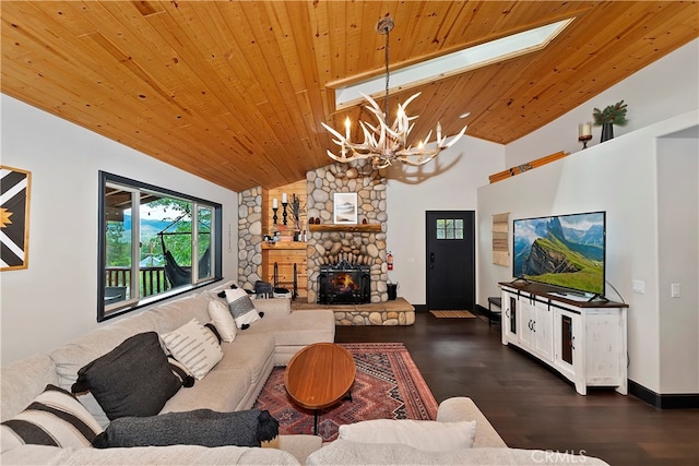 living room featuring a chandelier, vaulted ceiling with skylight, dark hardwood / wood-style floors, and wooden ceiling