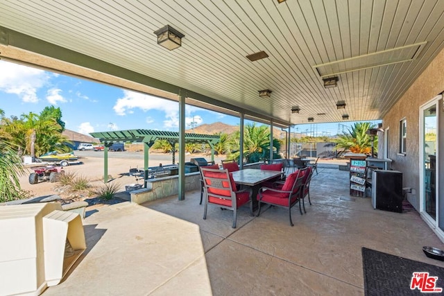 view of patio featuring a mountain view