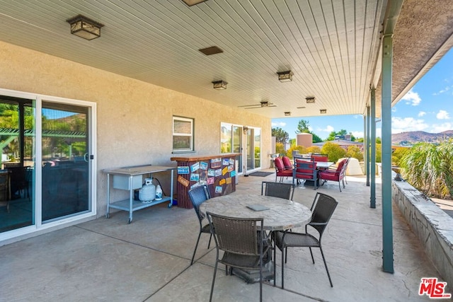 view of patio featuring a mountain view