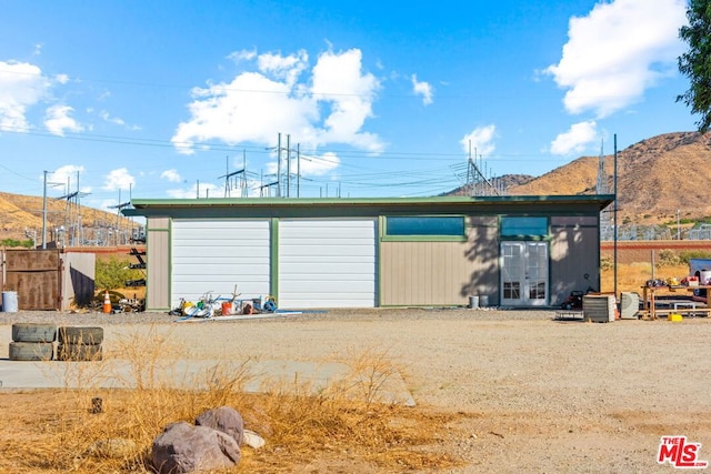 exterior space featuring a mountain view