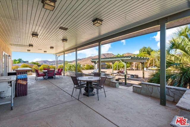 view of patio featuring a mountain view