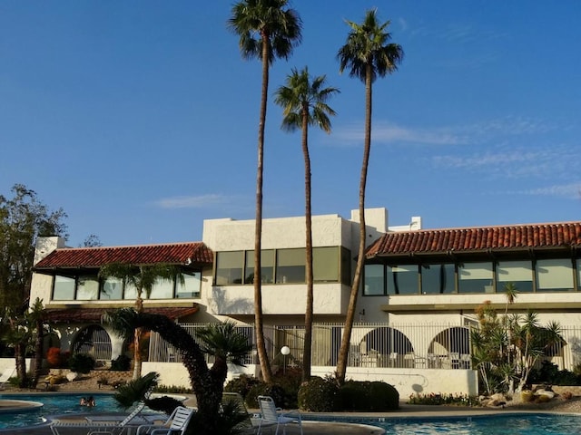 view of property with a community pool